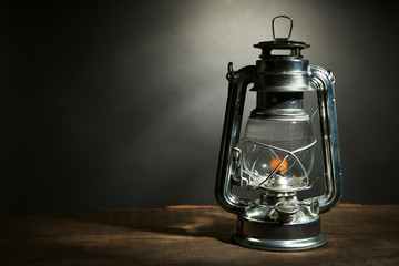 Kerosene lamp on dark grey background