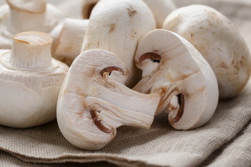 fresh white champignon on wood table