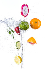 Fototapeta na wymiar Fruit with water splash