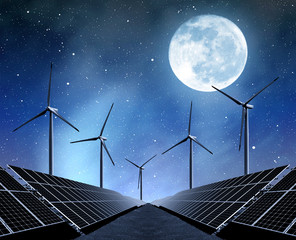 solar energy panels and wind turbines in night