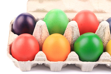 Colorful Easter Eggs in box.