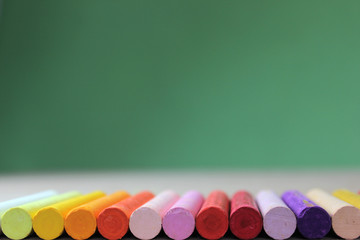 Crayons lined up in rainbow