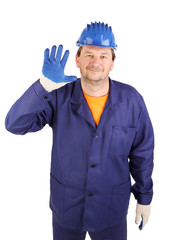 Worker putting on rubber glove