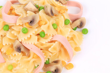 Pasta with mushrooms and sausage.