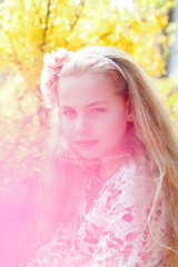 portrait of a little girl with flower in her hair