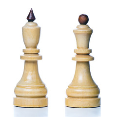 Wooden chess-men isolated on a white background. King and queen