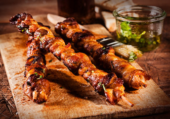 Trio of grilled barbecued beef kebabs