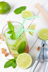 Mojito cocktail on wooden table