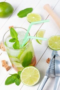 Mojito cocktail on wooden table