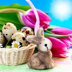 Easter eggs in the basket and rabbit