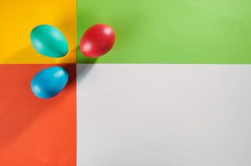 Colorful Easter eggs over creative editable background.