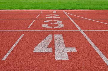 Running track numbers one two three four in stadium