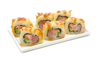 Japanese cuisine - hot rolls on a plate on white background