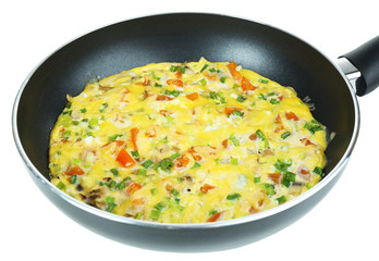 Omelet with vegetables close up