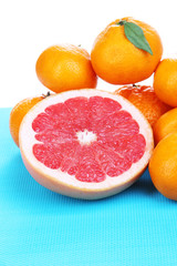 Ripe sweet tangerines and grapefruit,