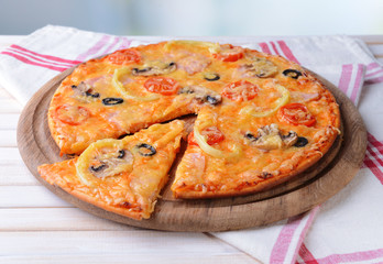 Tasty pizza on table close-up