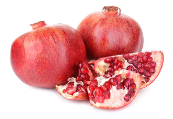 Ripe pomegranates isolated on white