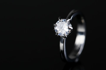 Beautiful diamond ring on gray background