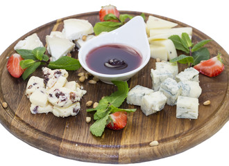 cheese plate with a large decorated the assortment of mint
