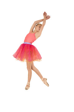 Beautiful young girl ballerina wearing a pink outfit