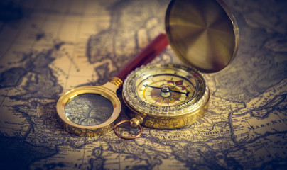 compass and magnifying glass