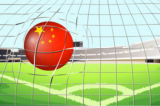 A soccer ball at the field with the flag of China