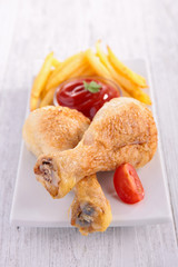 grilled chicken legs and fries