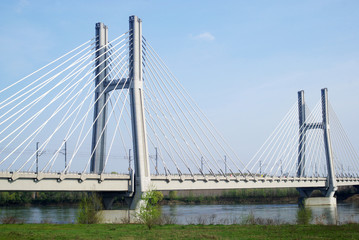 Fototapeta na wymiar Cable stayed bridge across river Po in Northern Italy