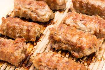 Romanian Meatballs Or Mici In Grill Frying Pan