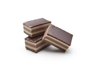 Chocolate pieces on a white background