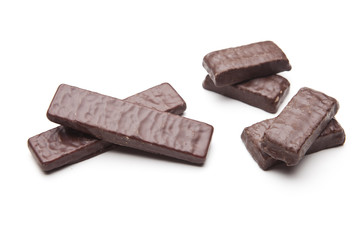 Chocolate pieces on a white background