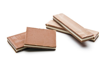 Chocolate pieces on a white background
