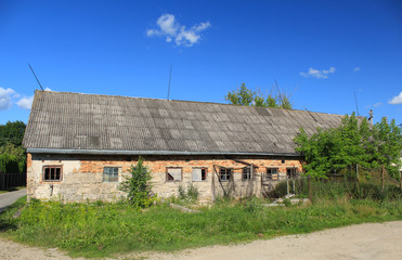 Fototapeta na wymiar Abandoned farm building