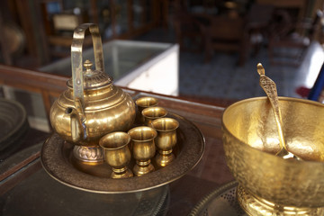 Fototapeta na wymiar chinese golden tea pot and cup in thailand