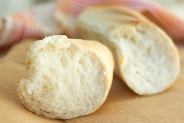 Obraz na płótnie Canvas White bread loaf near the napkins