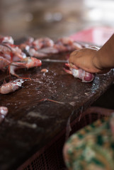 fresh fish fillet on a plank in sea market