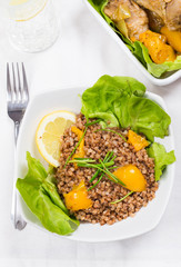 buckwheat with lemon and letuce and fried chicken