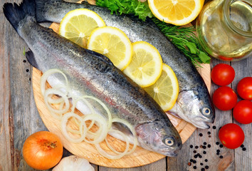 trout on a plate with vegetables