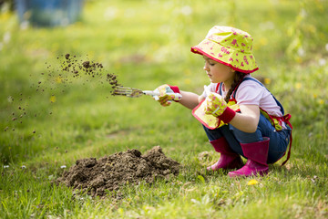 Little girl in the garden