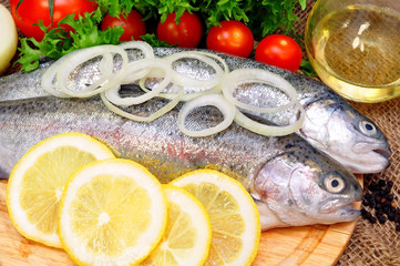 trout on a plate with vegetables