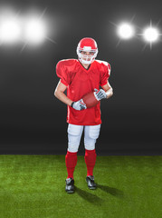 Obraz premium Portrait Of Confident American Football Player On Field