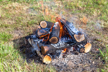 Closeup of warm fire burning in a campfire