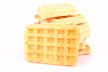 Pile of waffles on a white background