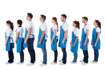 Obraz premium Large group of cleaners standing in a queue