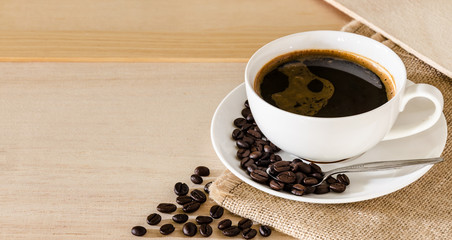 Coffee cup and coffee beans background