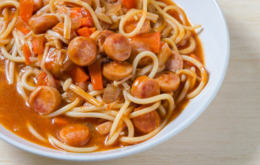 a dish of Spaghetti sausage