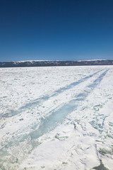 Winter ice road through Baikal