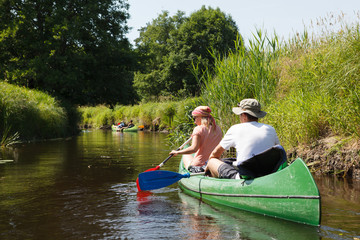 People boating on river