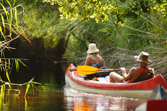 People boating on river