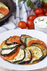 Ratatouille, vegetables cut on slices, eggplant, zucchini
